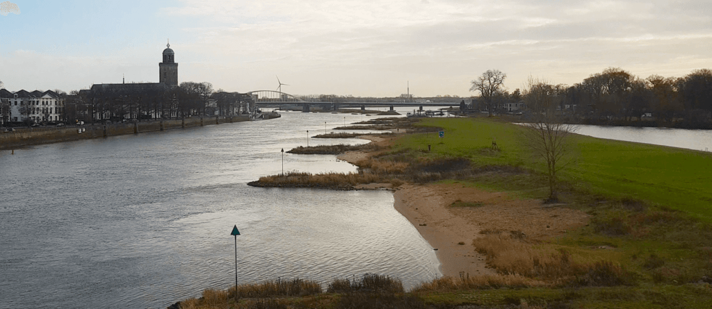 Hamburg to Amsterdam: Train crossing a river at the dutch city Deventer